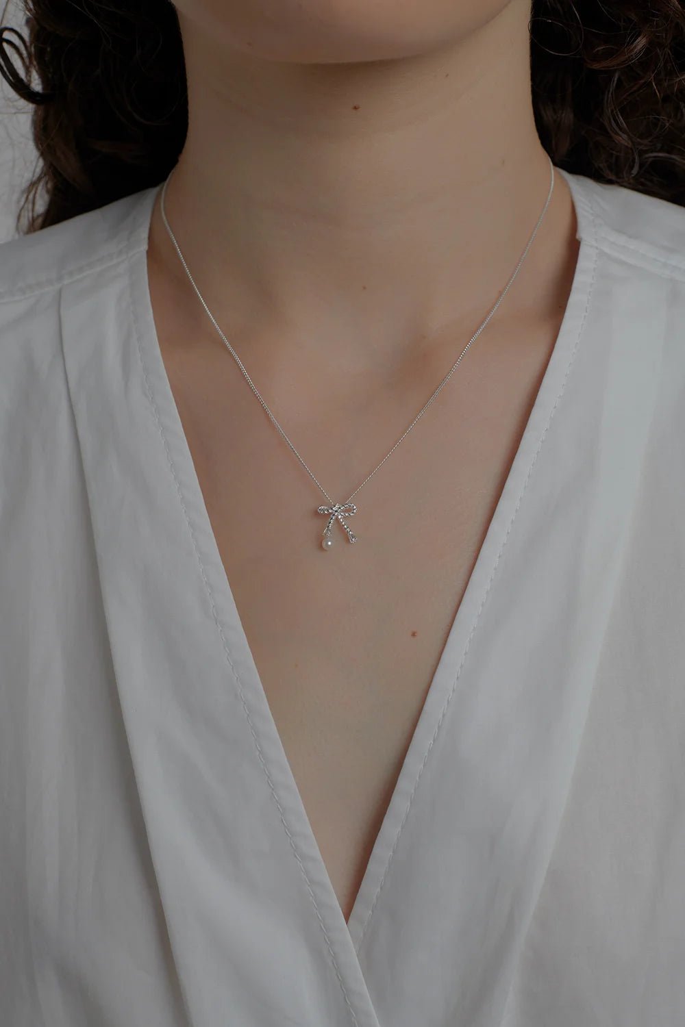 Karen Walker | Love Knot Necklace | Silver | Palm Boutique